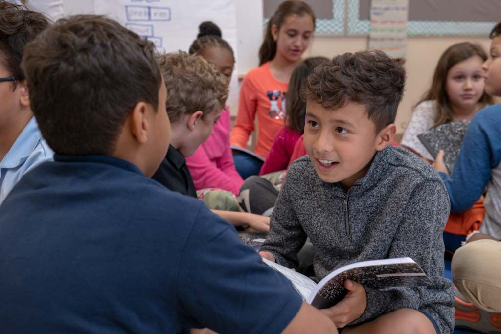 Students talking about texts.