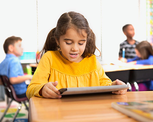 A student on a tablet.