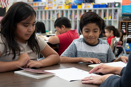 Students reading together